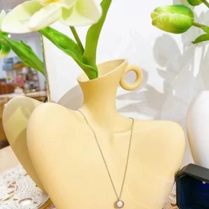 LỌ GỐM HÌNH NGƯỜI